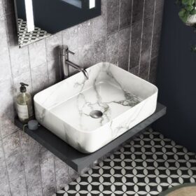 Arezzo 500 x 390mm curved rectangular countertop basin with a gloss white marble effect finish.